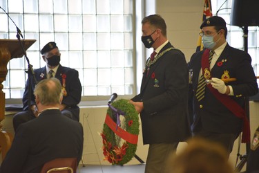 Woodstock mayor Trevor Birtch was among a small group to lay wreathes on Wednesday, as did MPP Ernie Hardeman and MP Dave MacKenzie. The elected officials also gave remarks as part of the scaled-down ceremony. (Kathleen Saylors/Woodstock Sentinel-Review)