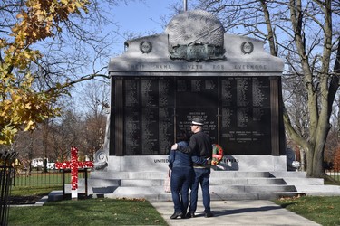 Many people stopped by the Woodstock cenotaph throughout the morning on Wednesday, even though this year's ceremony was held at Goff Hall to control crowd sizes. (Kathleen Saylors/Woodstock Sentinel-Review)