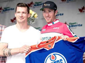 Anderson, right, at an earlier tournament before covid 19 with Andrew Ference. The professional cyclist from Spruce Grove recently retired from the sport after more than a decade earlier this month.