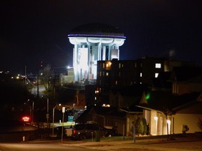 A string of Christmas lights now adorns the top of the Pearl Street water tower.