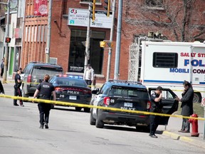 Police investigate a stabbing on Queen Street East in Sault Ste. Marie, Ont., on Friday, April 24, 2020. (BRIAN KELLY/THE SAULT STAR/POSTMEDIA NETWORK)