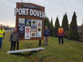Port Dover Lions Jim Cave, Dave Simpson, Alan Strang, and Ed Roesel completed the gateway sign project on Friday. (CONTRIBUTED)