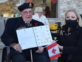 Lucan residents showed their appreciation to Second World War veteran Wally Christie Nov. 11 with a drive-by parade in his honour. Participants waved to Christie as he sat outside of Prince George Retirement Residence to see the love the community was sending his way. In addition to thanking him for his service, the community was also celebrating Christie’s 103rd birthday. To mark that occasion, Lambton-Kent-Middlesex MP Lianne Rood attended the parade and presented Christie with a certificate. Pictured are Wally Christie and Lianne Rood. See story and more photos inside. Dan Rolph