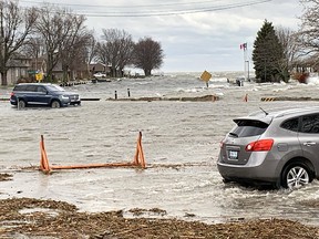 Powerful winds pushed waves from Lake St. Clair well past the pier at Mitchell's Bay, causing extensive flooding in the lakeside community in northwest Chatham-Kent on Sunday, Nov. 15. Ellwood Shreve/Postmedia Network