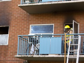 A balcony fire in a 32-unit apartment building in Strathroy has possibly damaged the entire roof of the structure forcing all the tenants to be moved to other locations. Mike Hensen/Postmedia Network