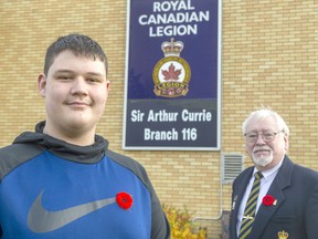 Mike Clarke, president of the Royal Canadian Legion Sir Arthur Currie Br. 116 in Strathroy, was impressed by the donation from 14-year-old Cooper Emmerton of Strathroy. The teen donated $100 he had saved for a trip that was cancelled because of the pandemic after learning a poppy box had been stolen from a restaurant in Strathroy. Mike Hensen/Postmedia Network