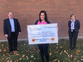 LKDSB Director of Education John Howitt (left) and SCCDSB Director of Education Deb Crawford (right) accept a cheque for $125,000 from Noelle’s Gift’s Nicole Paquette. The donation will be used by both boards to support students and families in need.Handout/Sarnia This Week
