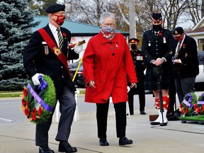 Judy Klages of Woodstock placed the Silver Cross Mother wreath at the Norfolk War Memorial in Simcoe Wednesday. Klages lost her son – Petty Officer Second Class Craig Blake of Simcoe – to a roadside bomb in Afghanistan in 2010. Monte Sonnenberg/Postmedia Network