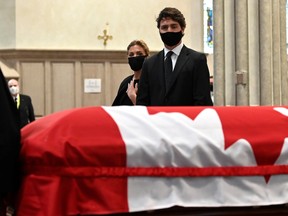 Canada's Prime Minister Justin Trudeau attends the state funeral service for former Canadian prime minister John Turner at St. Michael's Cathedral Basilica in Toronto on Oct. 6, 2020. Nathan Denette/Pool via REUTERS