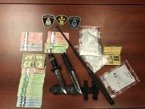 Drugs, weapons and money seized in Brockville raid.