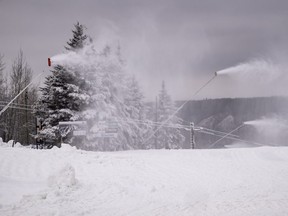 Snow-making equipment tries to assist Mother Nature in getting the ground cover in place on the run near the Platter Lift at Nitehawk on Monday, Nov. 16, 2020.