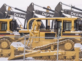 Heavy equipment fills the yard at the Ritchie Bros. auction yard east of Grande Prairie, Alta. on Monday, Nov. 16, 2020 as the company prepares for a large three day sale at the beginning of next week.