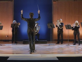 For its 16th season, the Stratford Symphony Orchestra is preparing launch its new online, concert series, SSO To Go. Pictured, principal conductor William Rowson leads a small group of Stratford musicians in a performance that was filmed at Avondale Church for the series. (Submitted photo)