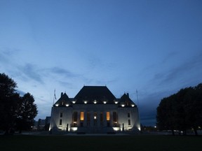 The Supreme Court of Canada is seen at sunset in Ottawa, Tuesday Sept. 1, 2020. The Supreme Court of Canada has affirmed that Ontario's sex-offender registry regime violates the constitutional rights of people found not criminally responsible by reason of mental disorder. (THE CANADIAN PRESS/Adrian Wyld)