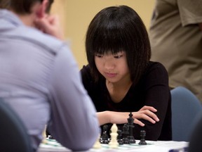 Qiyu Zhou, then 14, concentrates during the final rounds of the Canadian Open Chess Championships in Ottawa in 2013.