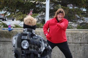 Lu Toneguzza leads Monday's outdoor low impact exercise session at Centennial Park in Sarnia. It's one of the programs offered by the West Lambton Community Health Centre. Information is available online at www.nlchc.com.