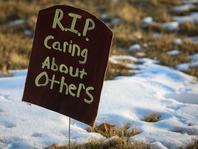 A makeshift graveyard with cardboard signs is seen in Calgary.
Al Charest / Postmedia