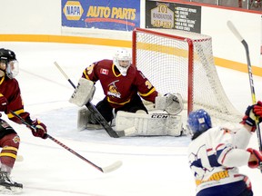 Timmins Rock goalie Tyler Masternak, shown hear stopping a one-timer off the stick of Rayside-Balfour Canadians forward Nicholas DeGrazia during Sunday’s 2-0 victory at the McIntyre Arena, has been named one of the Eastlink TV 3 Stars of the Week. The 20-year-old Oshawa native, who increased his NOJHL-best career shutout mark to 17, leads the league in most key goaltending categories. THOMAS PERRY/THE DAILY PRESS