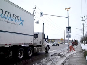 Drivers and pedestrians are adjusting to Tillsonburg's new crossover on Tillson Avenue, near Fourth Street, installed by Oxford County. (Chris Abbott/Norfolk & Tillsonburg News)