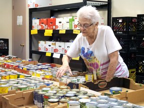 The Helping Hand Food Bank in Tillsonburg is introducing a new 12 Days of Giving food drive in December. Food donations can be dropped off in the alley behind the food bank (55 Broadway) on Dec. 12 and Dec. 19 from 9 a.m. to 3 p.m. Last year's one-day fall food blitz, shown here, brought in nearly 20,000 pounds of food. (Chris Abbott/Norfolk & Tillsonburg News/File photo)