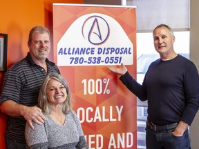 Alliance Disposal and Environmental 360 Solutions merged Nov. 1, bringing an opportunity of growth. Pictured are Alliance Disposal founders (left) Warren and Kendra Toews and Paul Coffey, VP of Community Affairs for Environmental 360 Solutions. Warren will continue running the company in Grande Prairie providing the high level of service Alliance's customers have grown accustomed to over the past decade.