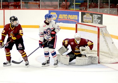 Rayside-Balfour Canadians captain Brady Maltais and Timmins blue-liner Eric Moreau watch as Joel Mongeon’s shot bends the twine behind Rock goalie Tyler Masternak during the third-period of Saturday night’s NOJHL contest at the McIntyre Arena. The power-play marker was the lone shot to beat Mastenak on the night as the Rock went on to post a 4-1 victory. THOMAS PERRY/THE DAILY PRESS