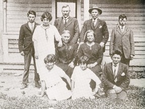 The John Peter Paul Gaudet family and the St. Germains. Back Row (l-r): Charles, Celena, John Gaudet, Mr. and Mrs. St. Germain, Joe Gaudet; Centre Row: Margueret Gaudet, her sister Mrs. St. Germain; Front Row: Dora, Christina and James Gaudet. Location and date unknown.