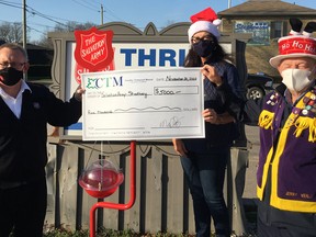 In lieu of the Mount Brydges Lions collecting donations for the Salvation Army this year, Caradoc Townsend Mutual Insurance donated $5,000, which will go towards the Christmas Hamper program. From left are Jason Dannock of the Salvation Army, Susan Clarke of Caradoc Townsend Mutual Insurance and Jerry Veale of the Mount Brydges Lions Club.