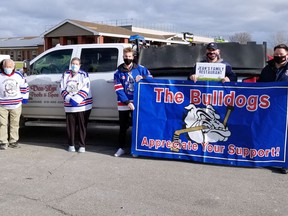 L-R: Dave Patterson (President Kincardine Bulldogs), Harold Maurer, Lynda Maurer (owners of Dar-Lyn Pools and Spas), Bryce McFadden (Bulldogs player), Warren Beisel (General Manager), and Mike Hackett (Asst. GM). SUBMITTED