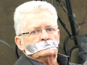 Outspoken council critic Don Rennick protested proposed changes to the city's procedural bylaw by placing duct tape over his month during a public meeting on the matter in October 2016. Nugget File Photo