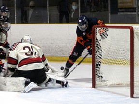 PETER RUICCI/Sault Star
Soo Thunderbirds winger Michael Chaffay (right) tries to deposit the puck past Blind River netminder Wyatt Courchaine in NOJHL action at John Rhodes Community Centre