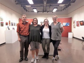 (Left to right) Greg Strach, Leila McDowell, Holly Wowk and Sue Hayduk. Pop in and check out the Canmore Art Guild annual Christmas Show and Sale, with COVID-19 safety protocols in place at Elevation Place, running Nov. 28. to Dec. 20. during hours of Thursday to Sunday 10 a.m. to 4 p.m. Photo Marie Conboy/ Postmedia.