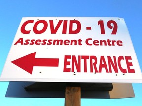 A sign marks the entrance to the COVID-19 assessment centre in Trenton.
