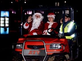 Having arrived early by sleigh from the North Pole, Santa and Mrs. Claus left Blockhouse Island briefly for some refreshments and were driven back by Rotarian Ed Coon, co-chairman of the organizing committee.