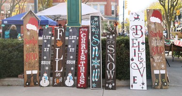 The Sign Girls from Ridgetown, Ont., sell their handmade creations at the annual All I Want For Christmas Expo at Downtown Chatham Centre in Chatham, Ont., on Saturday, Nov. 7, 2020. Mark Malone/Chatham Daily News/Postmedia Network