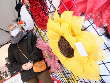 Deb Galos of Wreaths & More by Debi shows her creations at the annual All I Want For Christmas Expo at Downtown Chatham Centre in Chatham, Ont., on Saturday, Nov. 7, 2020. Mark Malone/Chatham Daily News/Postmedia Network