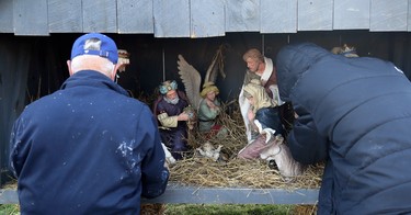 Members of St. Joseph Knights of Columbus Council 10436 set up a nativity scene at St. Joseph Roman Catholic Church in Chatham, Ont., on Saturday, Nov. 28, 2020. Mark Malone/Chatham Daily News/Postmedia Network