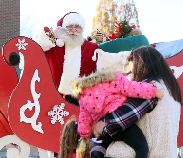 Santa Claus greets visitors at the Historic Downtown Chatham Business Improvement Area parking lot in Chatham, Ont., on Saturday, Nov. 28, 2020. He was in the BIA parking lot because the COVID-19 pandemic led to the cancellation of the annual Christmas parade. Mark Malone/Chatham Daily News/Postmedia Network