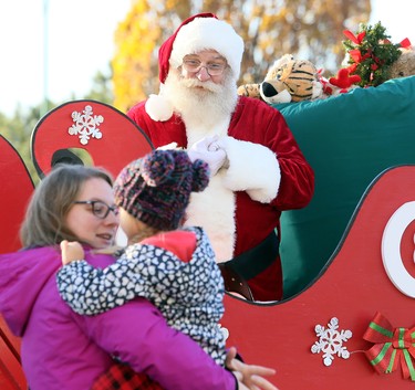 Santa Claus greets visitors at the Historic Downtown Chatham Business Improvement Area parking lot in Chatham, Ont., on Saturday, Nov. 28, 2020. He was in the BIA parking lot because the COVID-19 pandemic led to the cancellation of the annual Christmas parade. Mark Malone/Chatham Daily News/Postmedia Network
