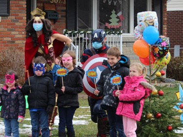Wonder Woman and Captain America pose with the Wilson kids and friends. Photo on Saturday, November 28, 2020, in Cornwall, Ont. Todd Hambleton/Cornwall Standard-Freeholder/Postmedia Network