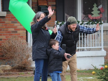 Connor, mom and dad acknowledging the support on the street. Photo on Saturday, November 28, 2020, in Cornwall, Ont. Todd Hambleton/Cornwall Standard-Freeholder/Postmedia Network