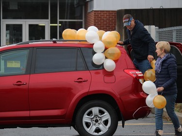 Some of the pre-parade prep, going on in a staging area. Photo on Saturday, November 28, 2020, in Cornwall, Ont. Todd Hambleton/Cornwall Standard-Freeholder/Postmedia Network