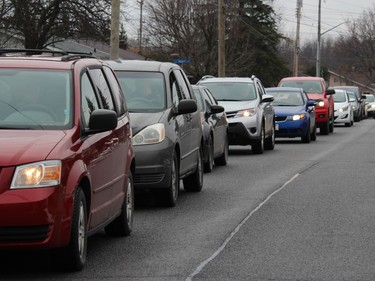 Some rare stop-and-go traffic in this quiet residential neighbourhood. Photo on Saturday, November 28, 2020, in Cornwall, Ont. Todd Hambleton/Cornwall Standard-Freeholder/Postmedia Network
