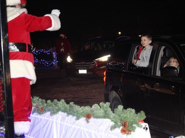 There were a lot of smiles at the parade, especially at the stop at Santa and Mrs. Claus' booth. Photo on Saturday, November 28, 2020, in Cornwall, Ont. Todd Hambleton/Cornwall Standard-Freeholder/Postmedia Network