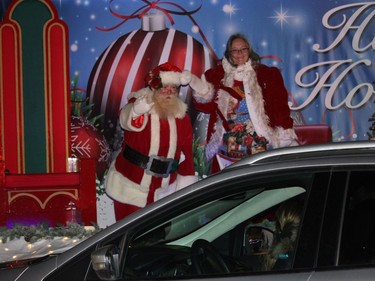 Santa and Mrs. Claus greeting drive-by guests. Photo on Saturday, November 28, 2020, in Cornwall, Ont. Todd Hambleton/Cornwall Standard-Freeholder/Postmedia Network