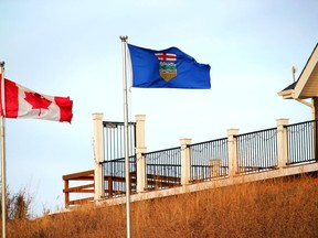 The provincial flag flies in front of the ClubHouse Activity Centre in Cochrane Ranche on November 26. Patrick Gibson/Cochrane Times