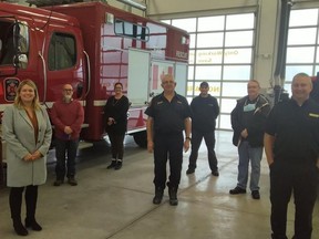 Officials at the Walkerton Fire Hall, from left, Brockton Mayor Chris Peabody, Chief Administrative Officer Sonya Watson, Lyle Quan, Clerk Fiona Hamilton, Interim Fire Chief Glen Wilhelm, Firefighter Chris Wilson, Guy Degagne, and Incoming Director of Fire and Emergency Services Chris Wells.