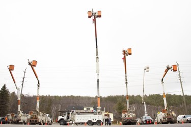 A crew from Ontario Hydro set up a flag tribute to OPP constable Marc Hovingh along Highway 69 at Pioneer Road, just across from the local OPP headquarters. A procession that included the hearse carrying Hovingh’s body travelled from Toronto to Manitoulin Island on Nov. 23. Hovingh, 52, was killed in the line of duty on Nov. 19 while responding to a call in the Gore Bay area. He leaves behind his wife, Lianne, and their four children. A civilian was also killed in the tragic incident. Mary Katherine Keown/The Sudbury Star