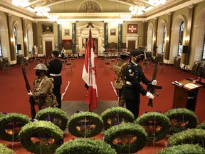A military honour guard takes its place at the cenotaph in Memorial Hall ahead of the start of the city’s Remembrance Day ceremony in Kingston on Wednesday. (Elliot Ferguson/The Whig-Standard)