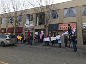 On Oct. 31 Fort Saskatchewan residents gathered downtown to protest cuts to public services and the privatization of Alberta Healthcare. Photo by Hanna Nicole.